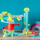 Baby Clementoni 17482 Fun Garage - Garázs pályaszett bukfencező autóval